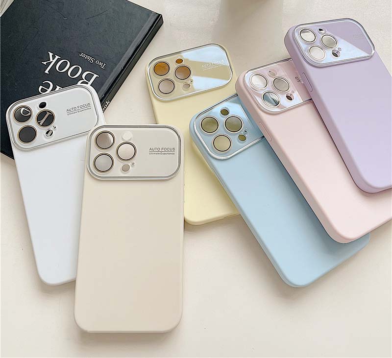 Trending pastel color phone cases in white, pink, yellow, and blue